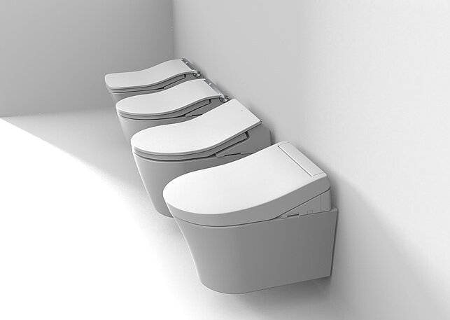 WASHLET RG,RX,RW et SW devant un mur blanc.